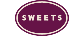 The word SWEETS, centered in a plum purple oval with a thin, inset cream colored border.