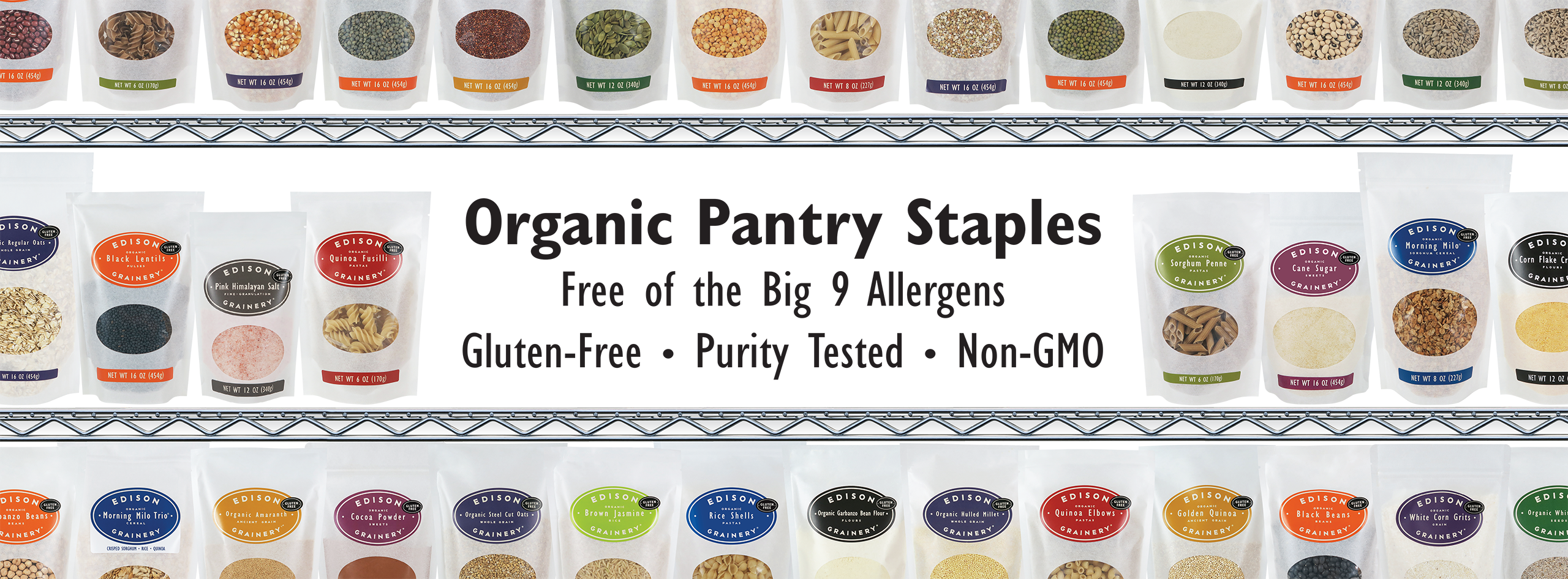 A wide angle photo of EDISON GRAINERY products lined up on a grocery shelf. In an open space at the center of the image are the words: "Organic Pantry Staples - Free of the Big 9 Allergens - Gluten-Free - Purity Tested - Non-GOM".