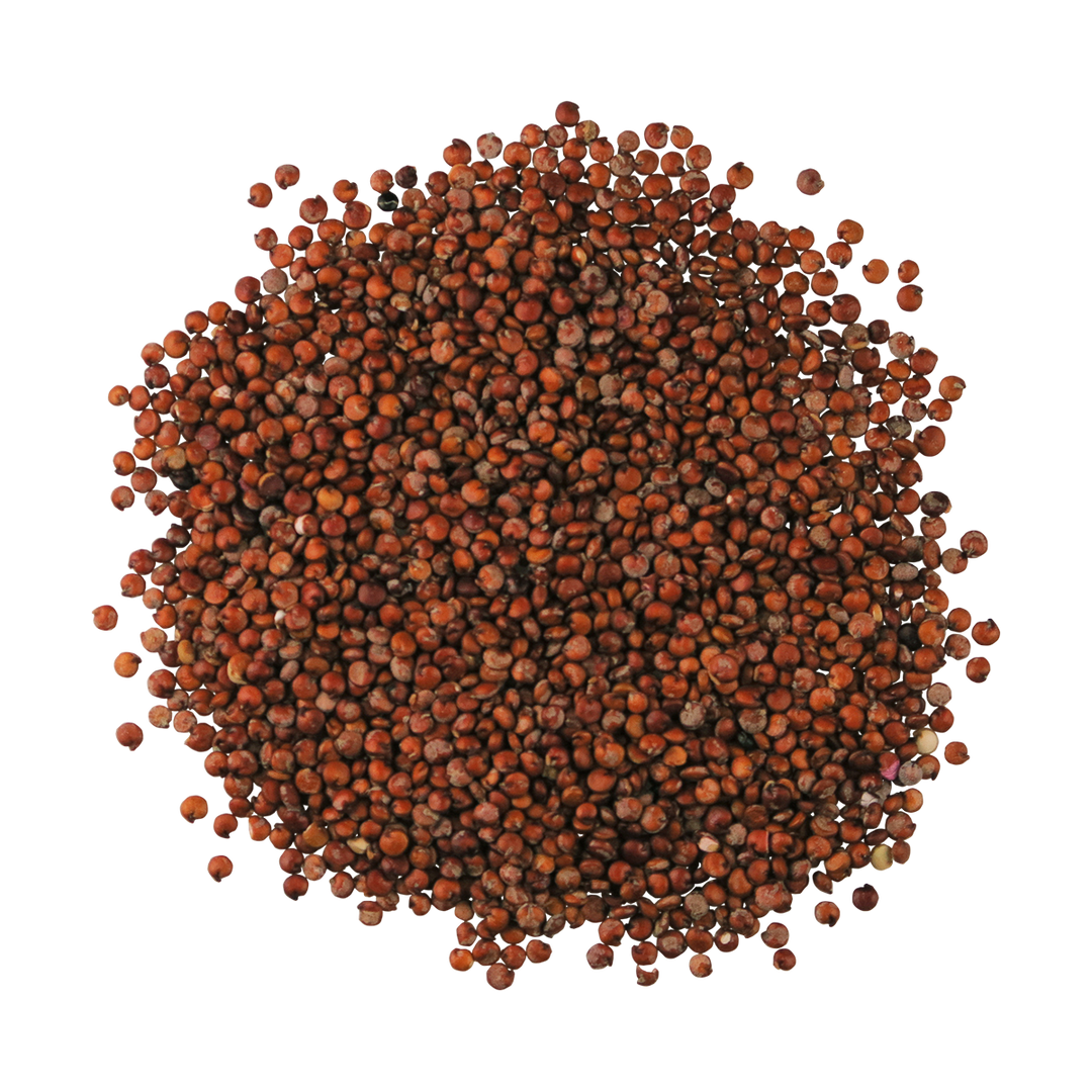 A top-down photo of a small pile of Organic Red Quinoa.