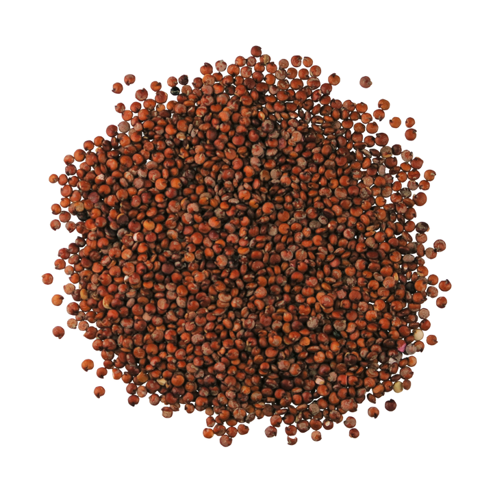 A top-down photo of a small pile of Organic Red Quinoa.