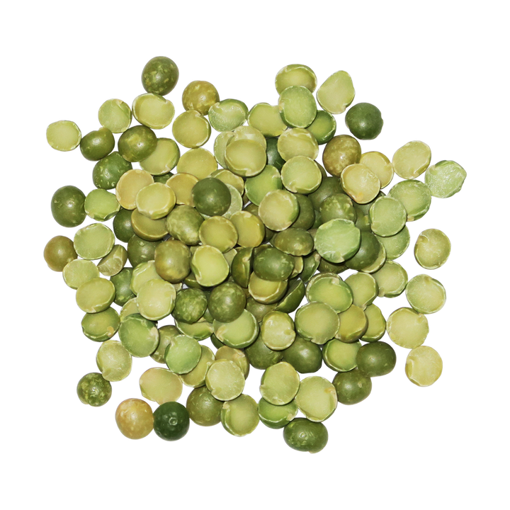 A top-down photo of a small pile of Organic Green Split Peas.