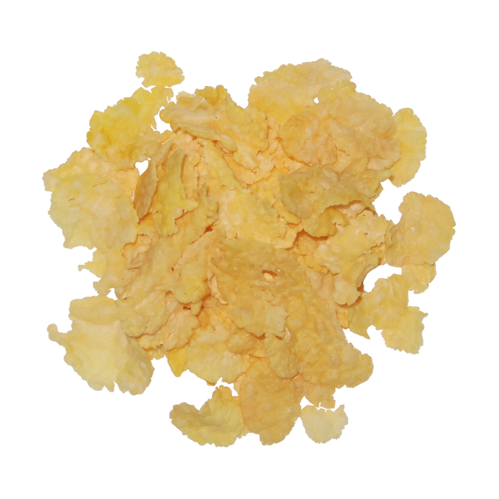 A top-down image of a small pile of Organic Corn Flakes Cereal..